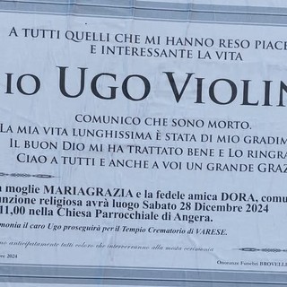 Il necrologio di Ugo Violini affisso ad Angera