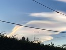 Una nuvola arcobaleno sul cielo del Varesotto