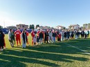 L’ingresso in campo a Venegono con madri, compagne, mogli, amiche, sorelle e figlie per supportare la battaglia alla violenza sulle donne