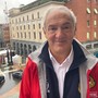 Renzo Oldani sul balcone della Camera di Commercio dopo la 103ª  Tre Valli sospesa dai corridori